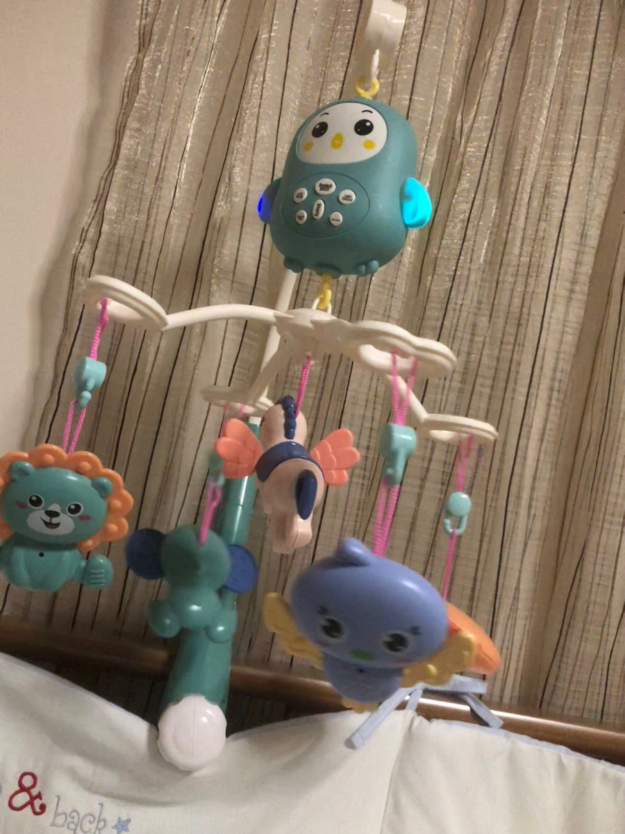 Multifunctional Interactive Happy Bed Bell Idealstore 360 Rotation Light Sound Effects Lullabies Animal Stories Detachable Rattles Remote Control Included