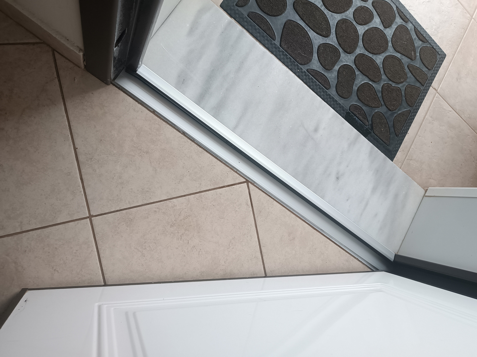 Multi Block Door Draft Stopper Door Wind and Water Blocker Door Draft Stopper Rod in Silver Color