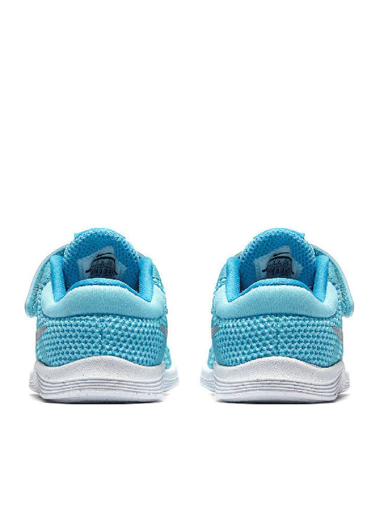 Revolution Revolution 4 TD Kinder Sportschuhe Laufen mit Bügel- und Schleifenverschluss Türkis