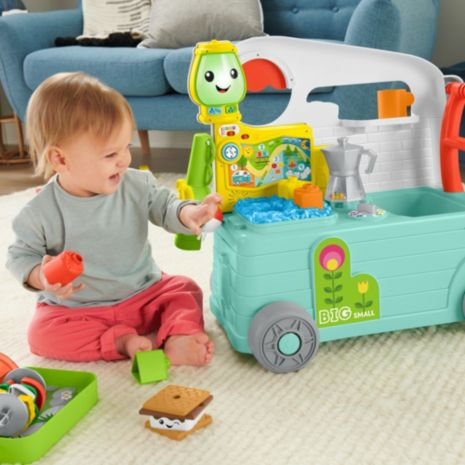 Fisher Price Vehicul Rulotă educativă 3 în 1 Smart Stages cu muzică pentru 9++ Luni