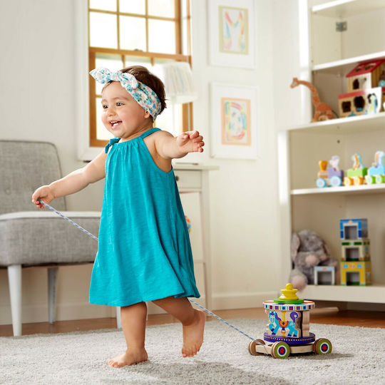 Melissa & Doug Pull-Along Toy First Spinning Carousel Pull Toy with Removable Play Pieces made of Wood for 18++ Months