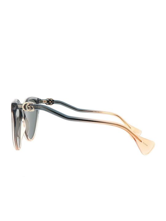 Gucci Damen Sonnenbrille mit Mehrfarbig Kunststoff Gestell und Schwarz Linse GG1011S 002