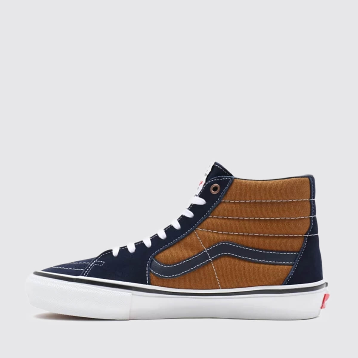 navy and brown vans