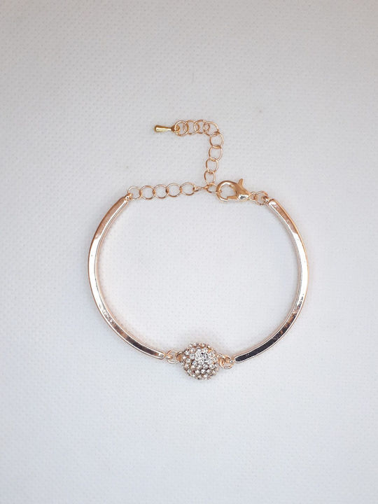 Women's bracelet with rhinestones in pink gold, made of brass alloy.