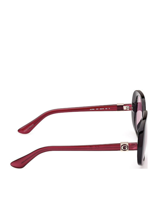 Guess Guess Damen Sonnenbrille mit Schwarz Horn umrandetem Rahmen und Lila Gläser GU7862 05Y