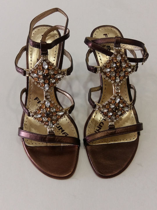 Bronzed leather sandals with stones and rhinestones that tie at the ankle