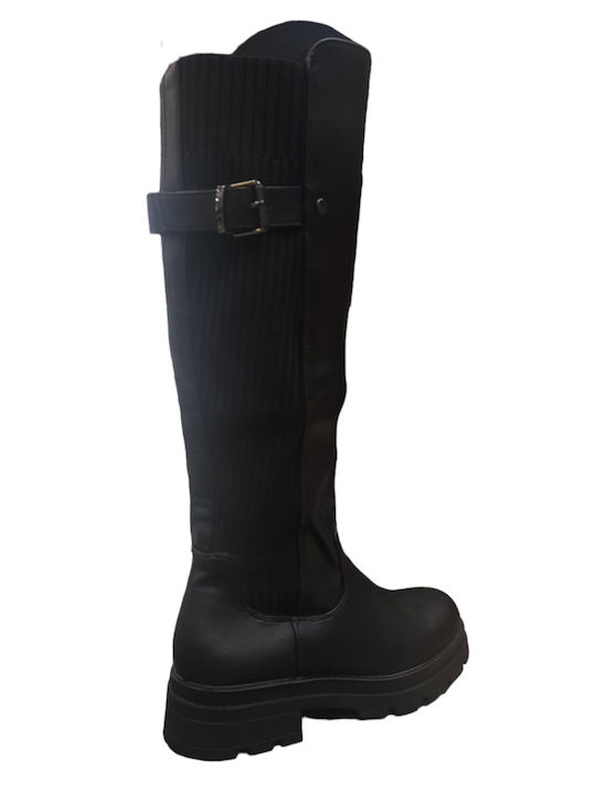 Women's boot with lug sole and sock on one side, black color