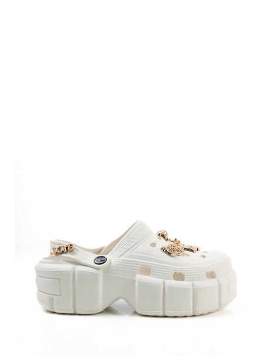 White Low Flatforms with Bold Decorative Elements