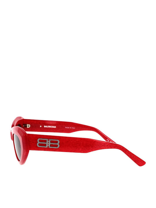 Balenciaga Damen Sonnenbrille mit Rot Kunststoff Gestell und Schwarz Linse