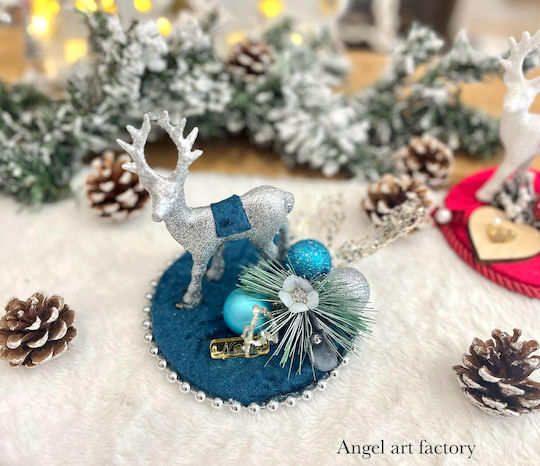 Dekoratives Arrangement „Blauer Rentier“