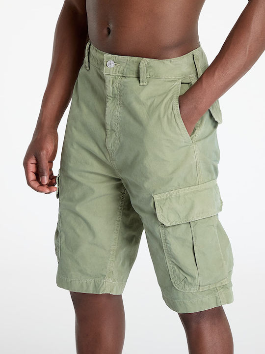 Къси панталони Tommy Jeans Otis Twill Regular Cargo в зелено