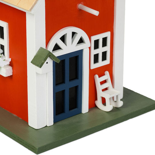 Dekoratives Vogelhaus im rustikalen Stil