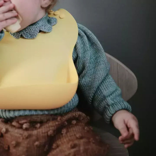Mushie Waterproof Bib Silicone with Button & Pocket Sunshine