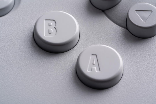 8Bitdo 64 Bluetooth Безжичен Геймпад с Хол Ефект Стикове за Android / Switch / Switch 2 Бял