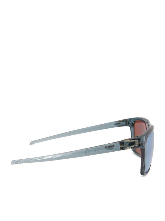 Oakley Leffingwell Herren Sonnenbrille mit Schwarz Kunststoff Gestell und Hellblau Polarisiert Spiegel Linse