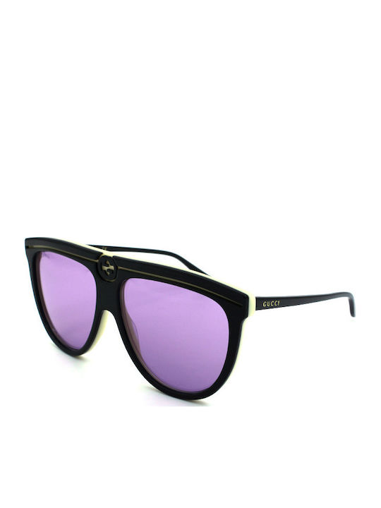 Gucci Damen Sonnenbrille mit Schwarz Kunststoff Gestell und Lila Linse GG0732S 004
