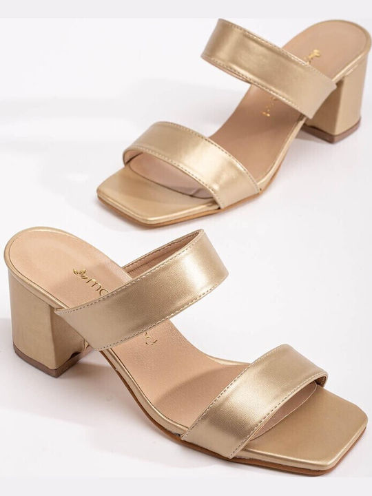 Leder Mules mit Absatz in Gold Farbe