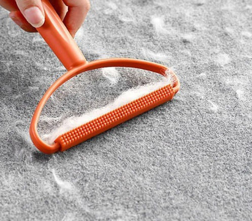 Manual Lint Removal Brush Orange