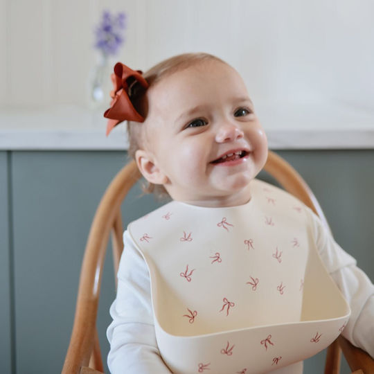 Mushie Waterproof Silicone Baby Bib with Button & Pocket Multicolour