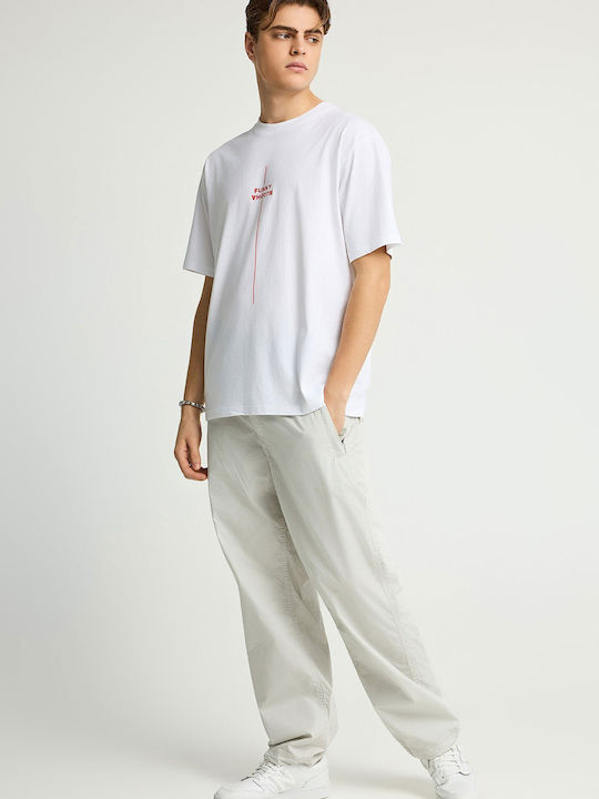 Trousers in Loose Fit Beige