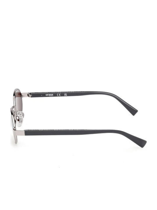 Guess Damen Sonnenbrille mit Silber Metall Gestell und Lila Linse GU00232 81Y
