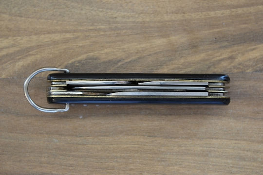 Remington Multi Messer in Scheide