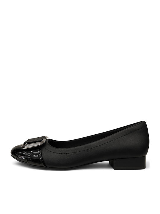 Spitze schwarze Pumps