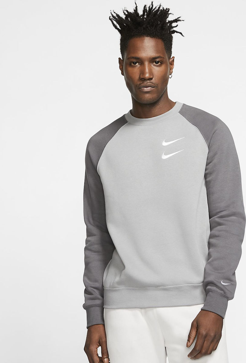 white nikes with grey swoosh