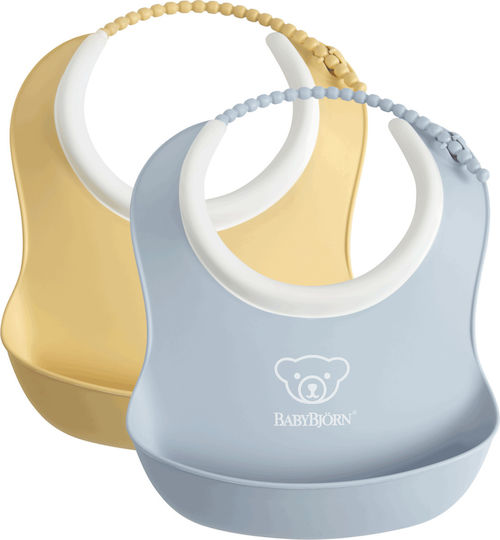 BabyBjorn Soft Small Impermeabila Bavetă Plastic cu buton & Buzunar Pulbere galbenă/pudră albastră pentru 4 m+ 2buc BabyBjorn Soft Small Impermeabila Bavetă Plastic cu buton & Buzunar Pulbere galbenă/pudră albastră pentru 4 m+ 2buc