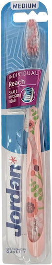 Jordan Individual Reach Medium Toothbrush Medium Toothbrush With Ergonomic Handle For Deep Cleaning 1 Piece Pink