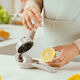 Nava Hand Press Lemon made of Plastic in Yellow Color