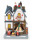 Eurolamp Toy Store Χριστουγεννιάτικο Φωτιζόμενο Διακοσμητικό Σπιτάκι Πράσινο Ρεύματος με Μουσική και Κίνηση 26.5x18.1x12.7cm