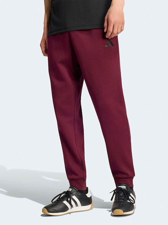 adidas Feelcozy Pantaloni de trening Burgundy