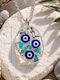 Elle Triple Talisman Eye Necklace Made of Blue Resin
